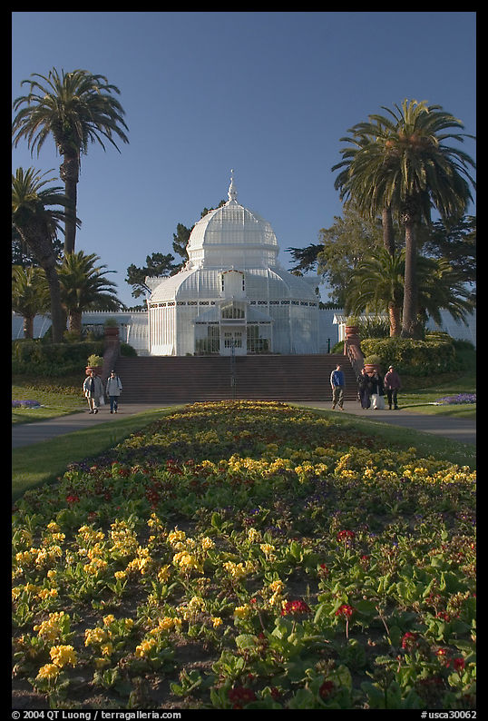 Flower bed and Conservatory of the Flowers, late afternoon, Golden Gate Park. San Francisco, California, USA