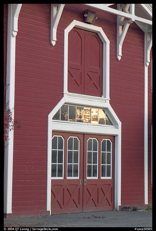 Door with sunset reflections, Red Barn. Stanford University, SF Bay area, California, USA