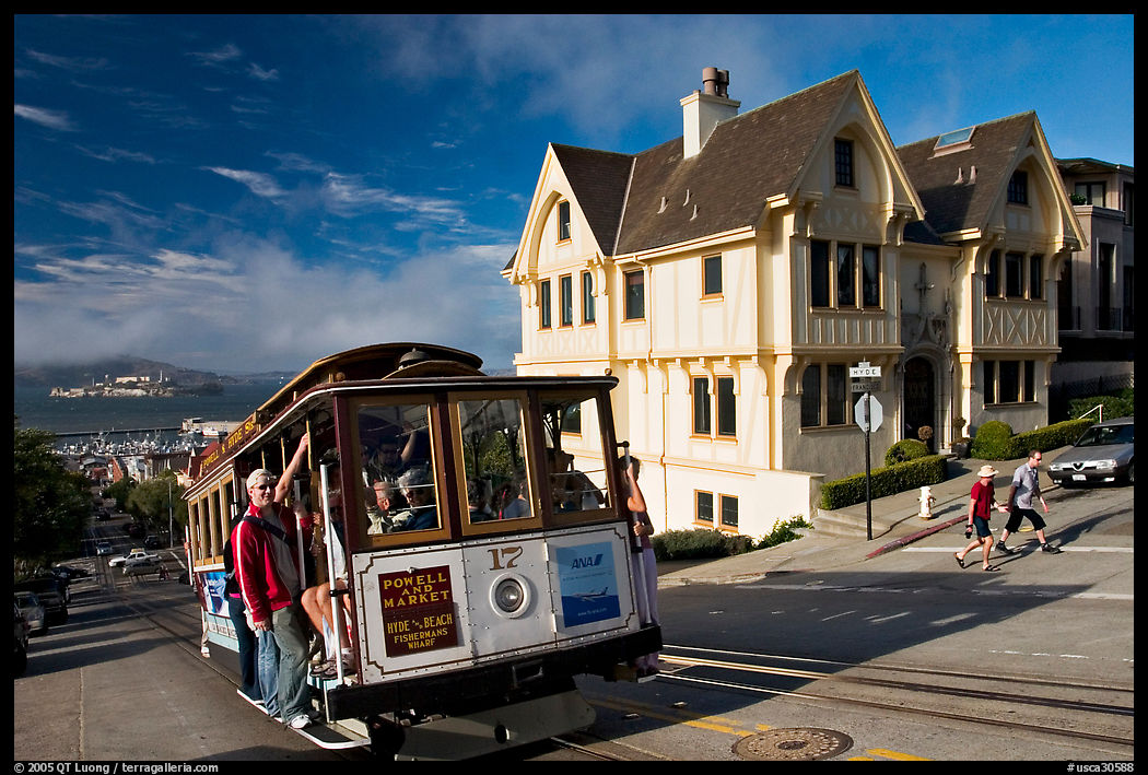 Cable car climbing, and Tudor house, late afternoon. San Francisco, California, USA