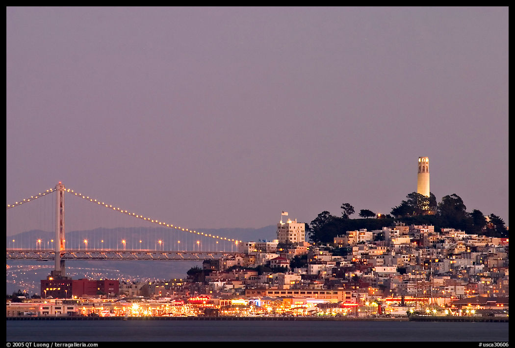 Telegraph Hill and Bay Bridge at dusk. San Francisco, California, USA