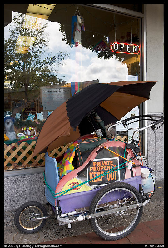 Homeless cart next to a pet store on  Santa Cruz avenue. Menlo Park, SF Bay area, California, USA
