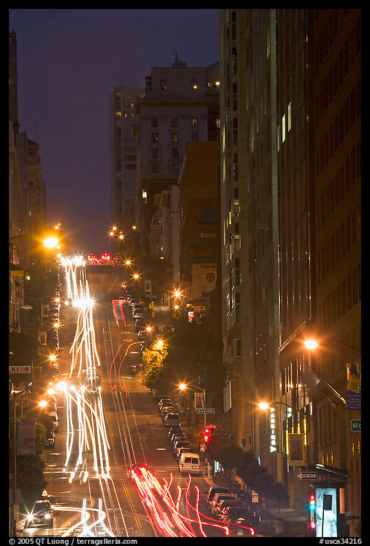 Steep California street and lights at night. San Francisco, California, USA