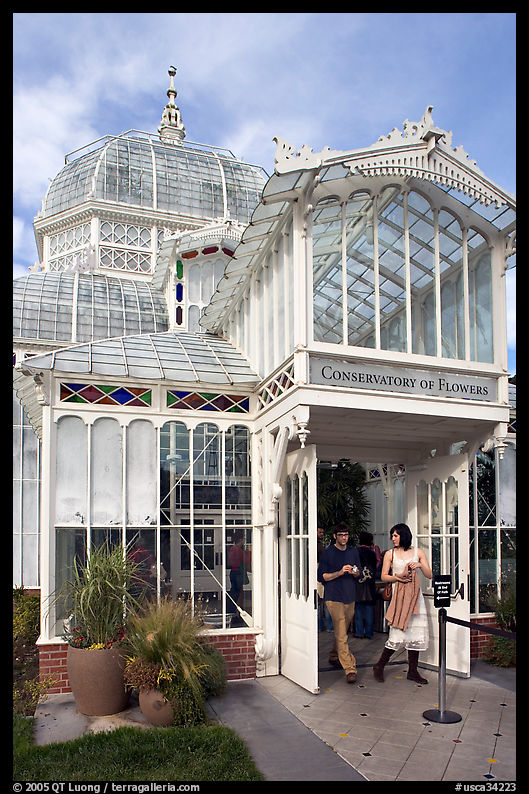 Couple exiting the Conservatory of Flowers. San Francisco, California, USA