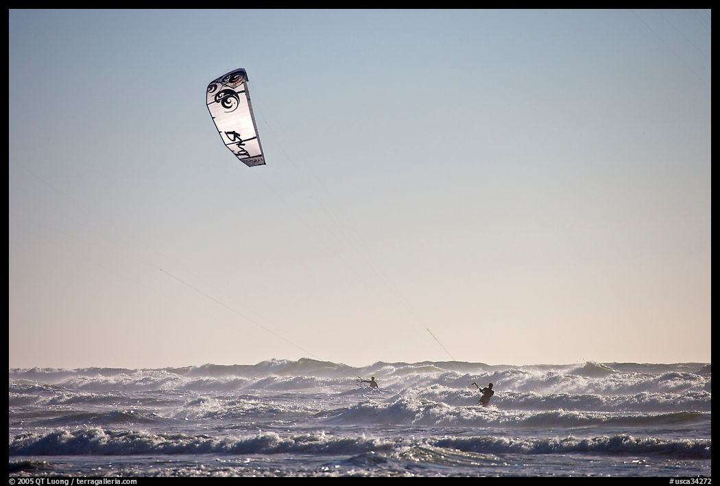 Kitesurfer in powerful waves, afternoon. San Francisco, California, USA