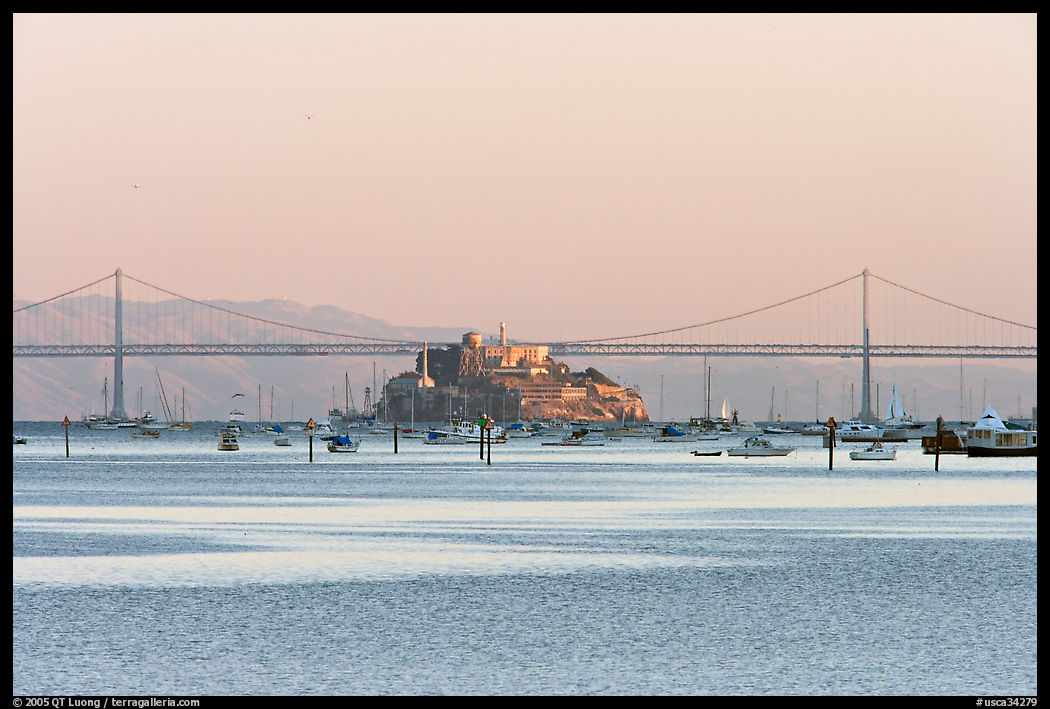 Alcatraz Island and Bay Bridge, sunset. San Francisco, California, USA