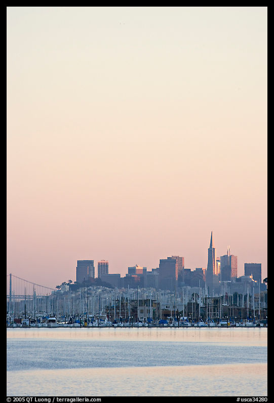 Sausalito houseboats and San Francisco skyline, sunset. San Francisco, California, USA
