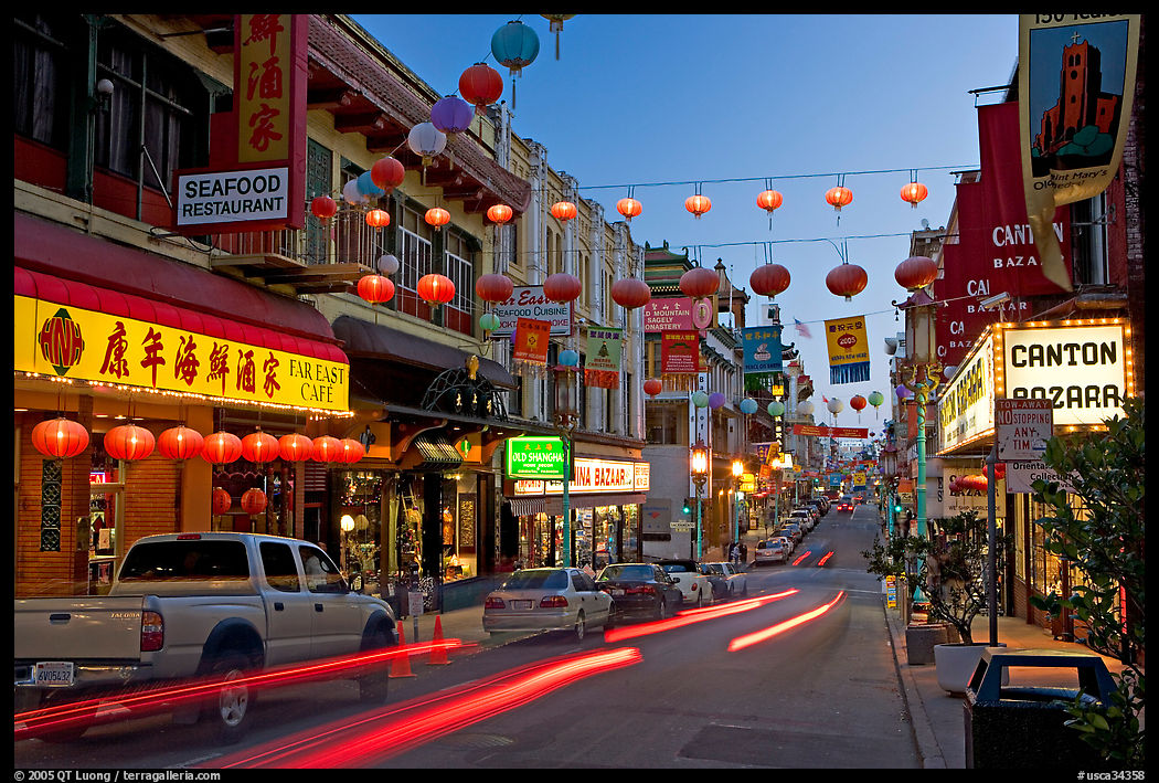 Lanterns and lights on Grant Street at dusk, Chinatown. San Francisco, California, USA