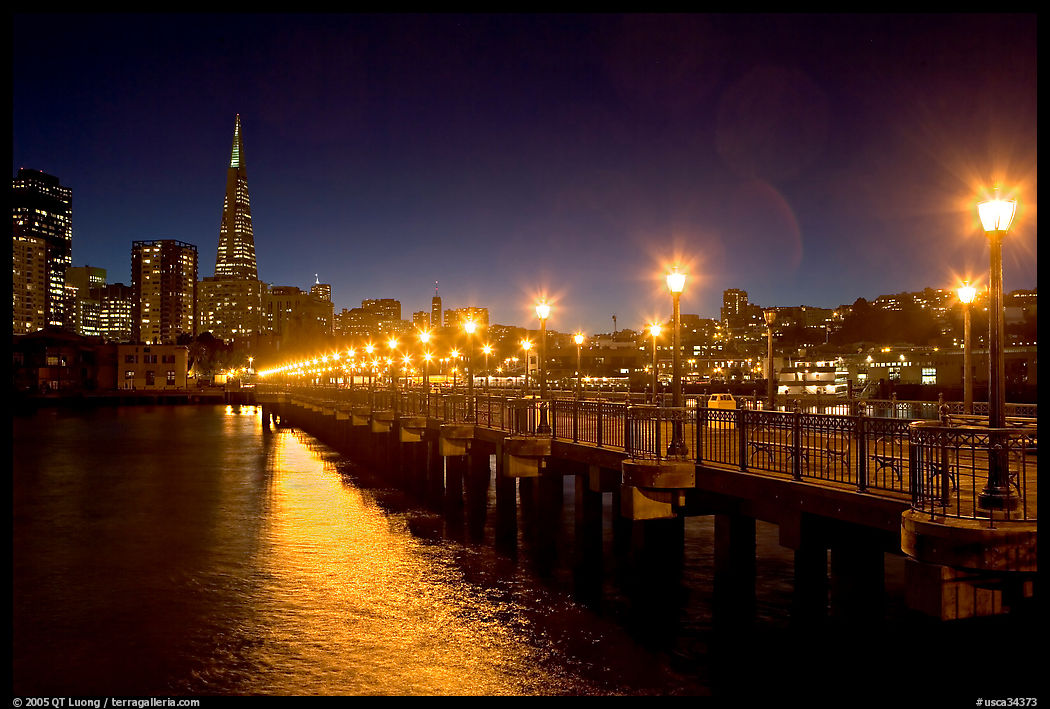Skyline, Pier 7 lights and reflections at night. San Francisco, California, USA