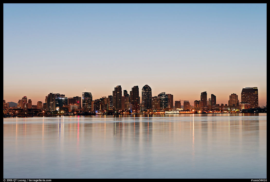 Skyline reflected in the waters of harbor, dawn. San Diego, California, USA
