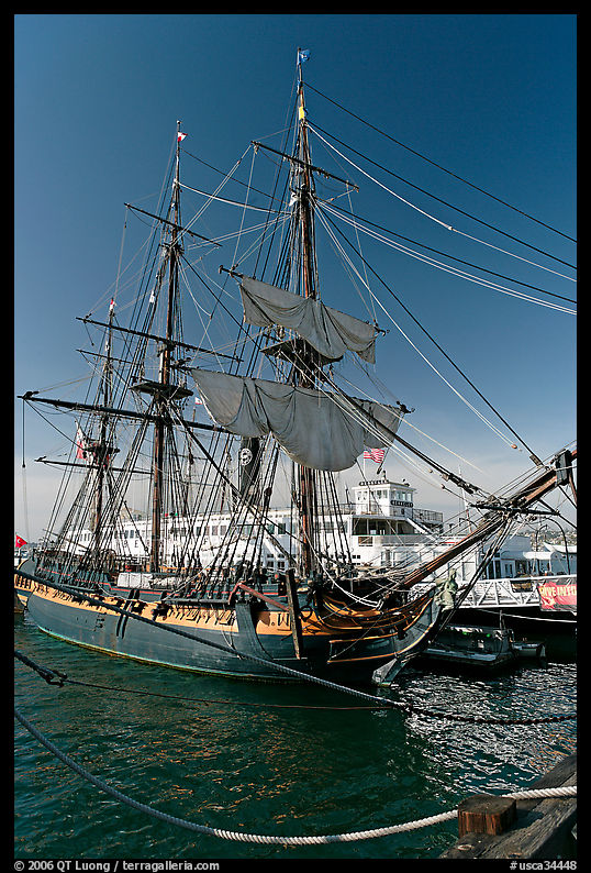 Maritime Museum with HMS Surprise and ferryboat Berkeley. San Diego, California, USA
