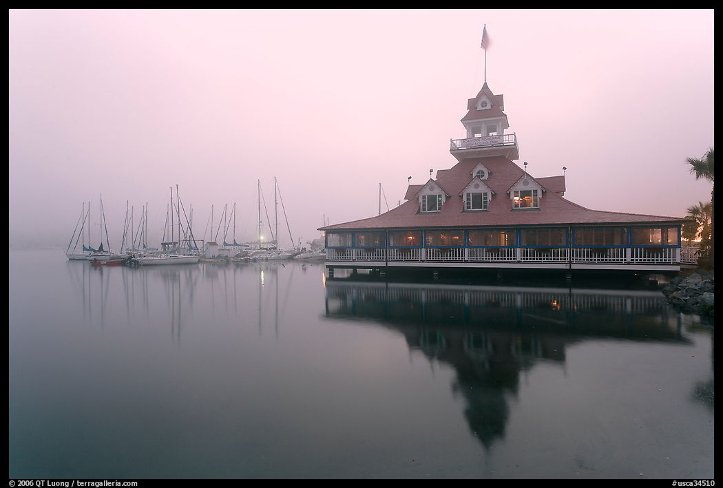 Boathouse and harbor in fog, sunrise, Coronado. San Diego, California, USA