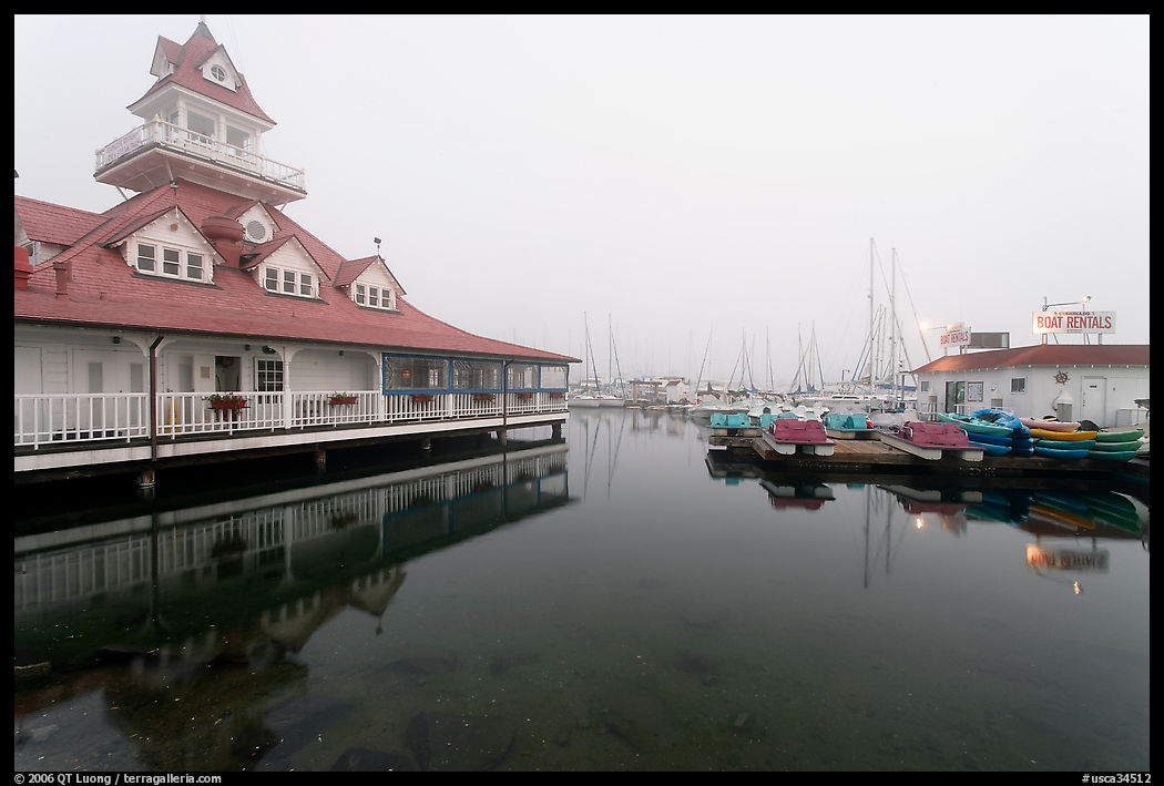 Period and modern boathouses in fog, Coronado. San Diego, California, USA