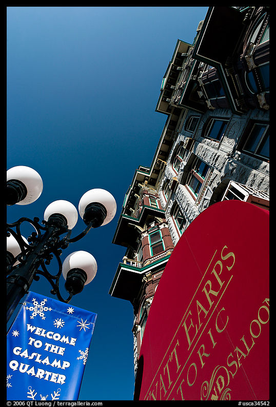 Gaslamp, signs, and facade of the Louis Bank of Commerce, Gaslamp quarter. San Diego, California, USA