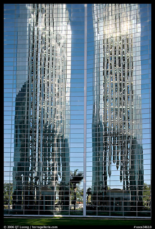 Bell tower reflected in Crystal Cathedral Facade. Garden Grove, Orange County, California, USA