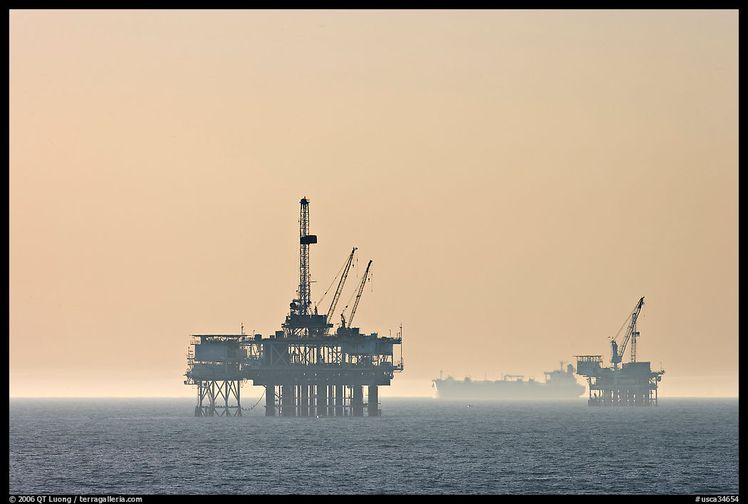 Off-shore drilling platforms and tanker. Huntington Beach, Orange County, California, USA