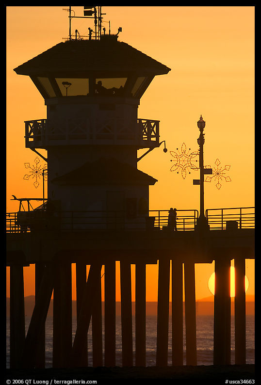 Lifeguard tower on Huntington Pier at sunset. Huntington Beach, Orange County, California, USA