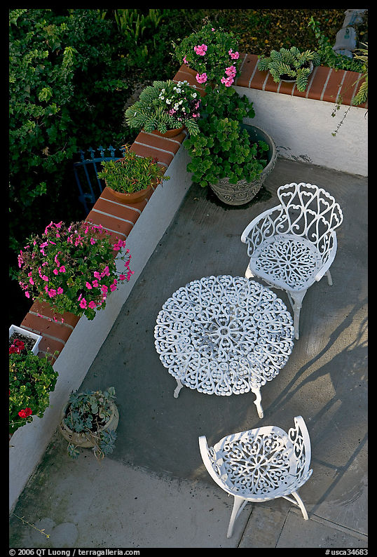 Garden chairs and table seen from above. Laguna Beach, Orange County, California, USA