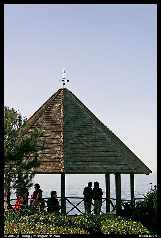 People standing in a Heisler Park Gazebo. Laguna Beach, Orange County, California, USA