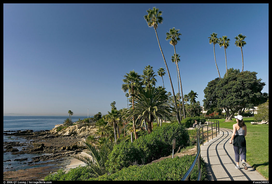 Woman jogging in Heisler Park, next to Ocean. Laguna Beach, Orange County, California, USA