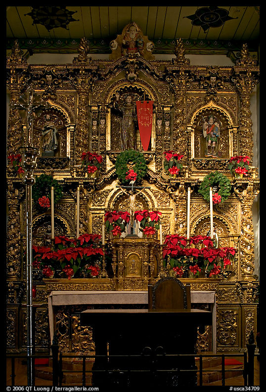 350 year old retablo made of hand-carved wood with a gold leaf overlay. San Juan Capistrano, Orange County, California, USA