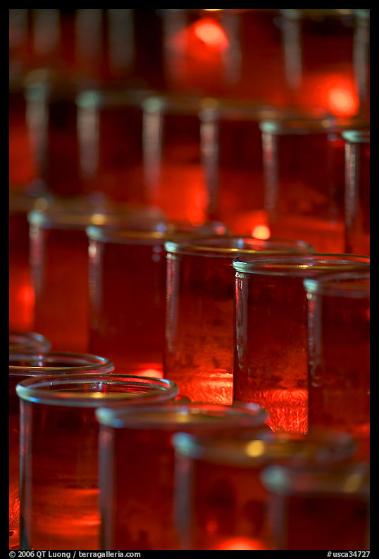 Candles in red glass, background blurred. San Juan Capistrano, Orange County, California, USA