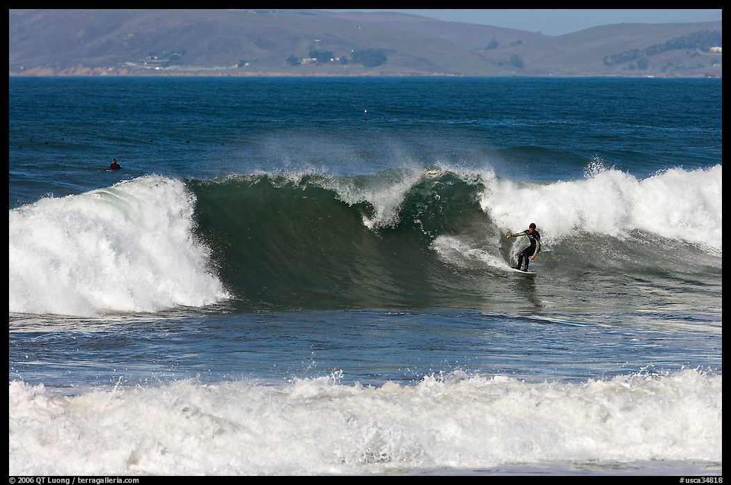 Surfer and wave. Morro Bay, USA