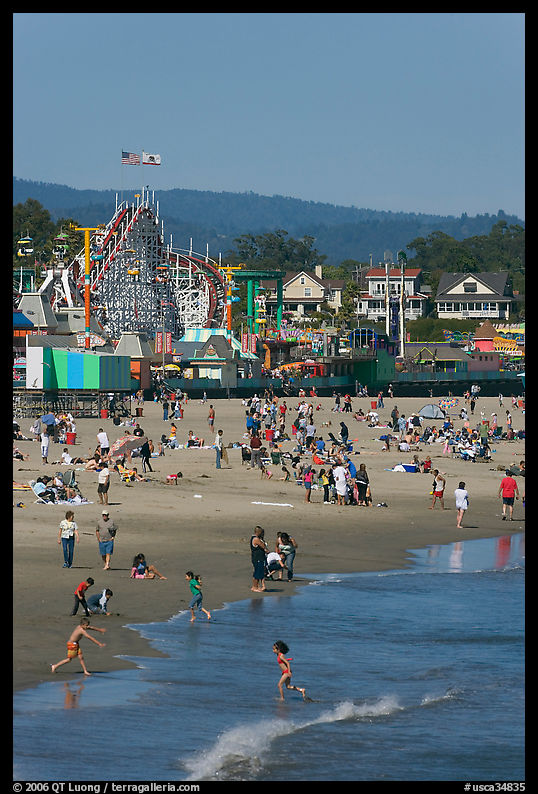 Children, beach, and boardwalk. Santa Cruz, California, USA