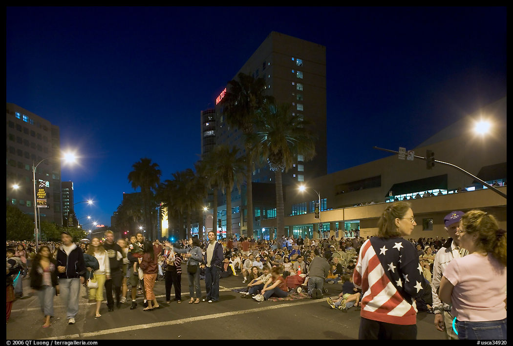 Families waiting for fireworks on Almaden street, Independence Day. San Jose, California, USA