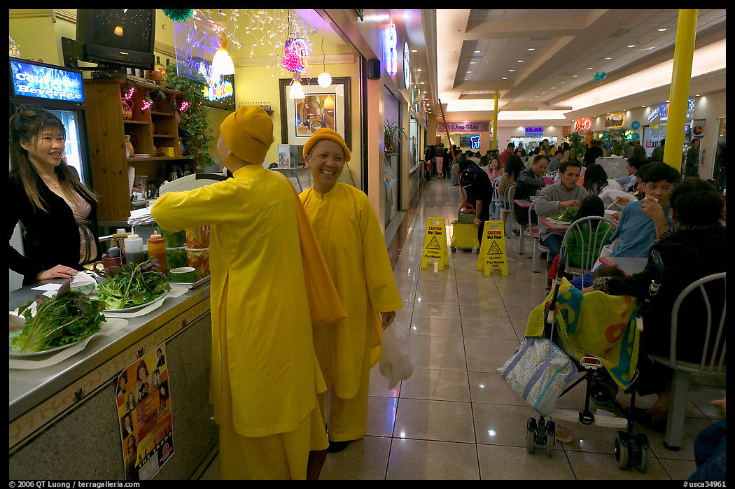 Buddhist nuns in the foot court of the Grand Century mall. San Jose, California, USA