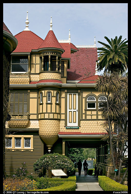 Mansion wing with door opening to a one-story drop. Winchester Mystery House, San Jose, California, USA