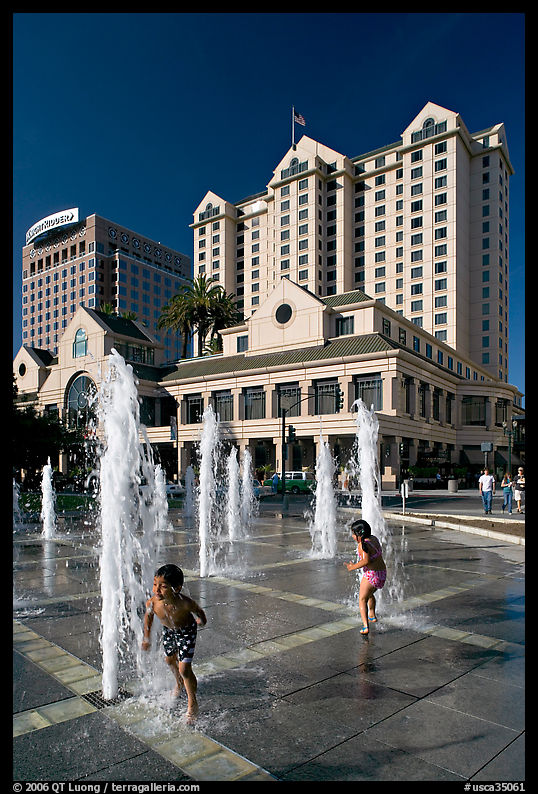 Children, fountain, Plaza de Cesar Chavez  and Fairmont Hotel. San Jose, California, USA
