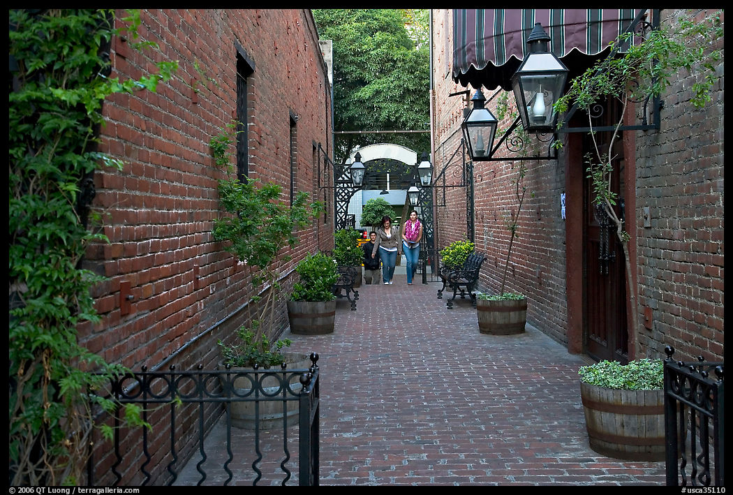Alley with red brick walls, San Pedro Square. San Jose, California, USA