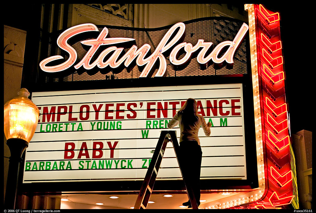 Neon signs and movie title being rearranged, Stanford Theater. Palo Alto, SF Bay area, California, USA