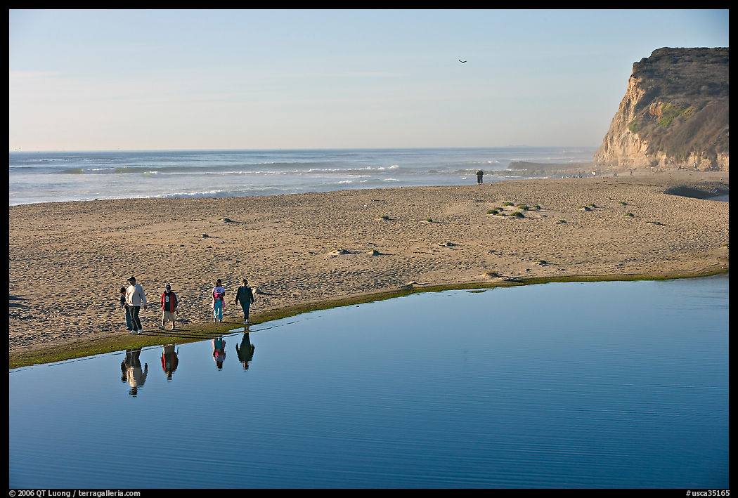 Family walking by lagoon, Scott Creek Beach. SF Bay area, California, USA