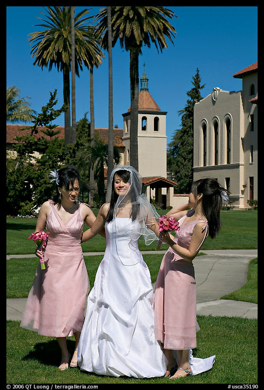 Bride and bridesmaids in front of mission, Santa Clara University, Santa Clara. SF Bay area, California, USA