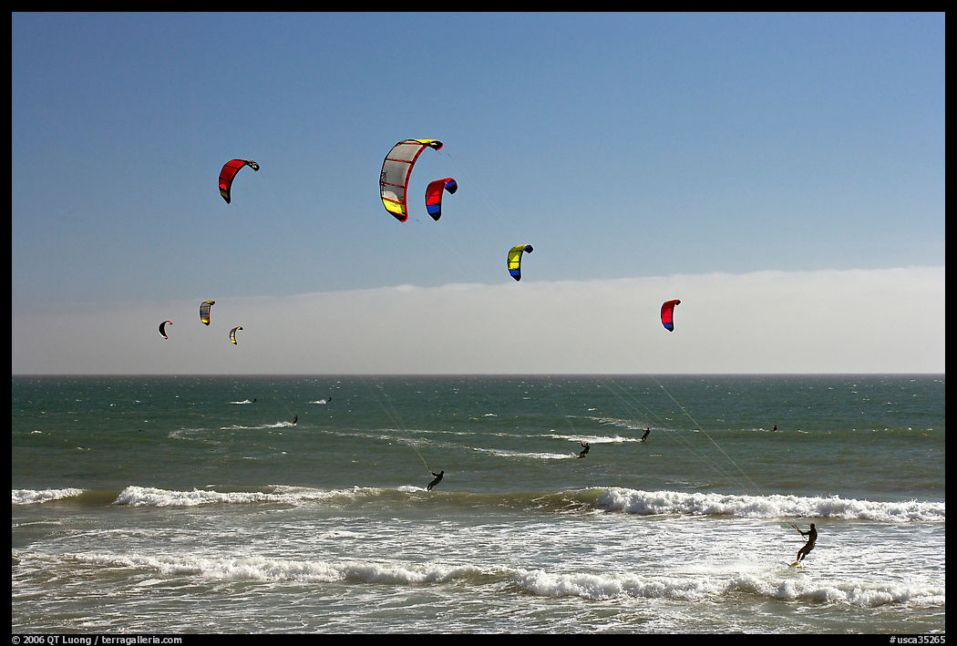 Group of kitesurfers, Waddell Creek Beach. SF Bay area, California, USA