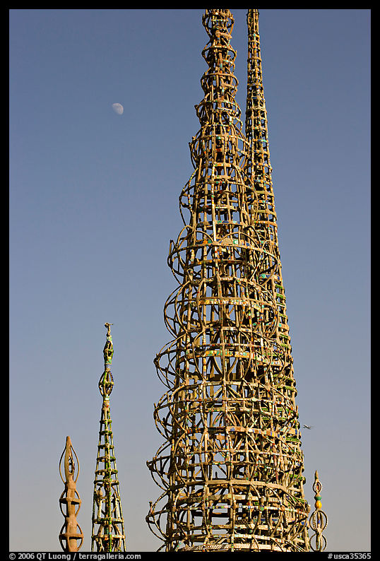 Simon Rodia Watts Towers and moon, late afternoon. Watts, Los Angeles, California, USA