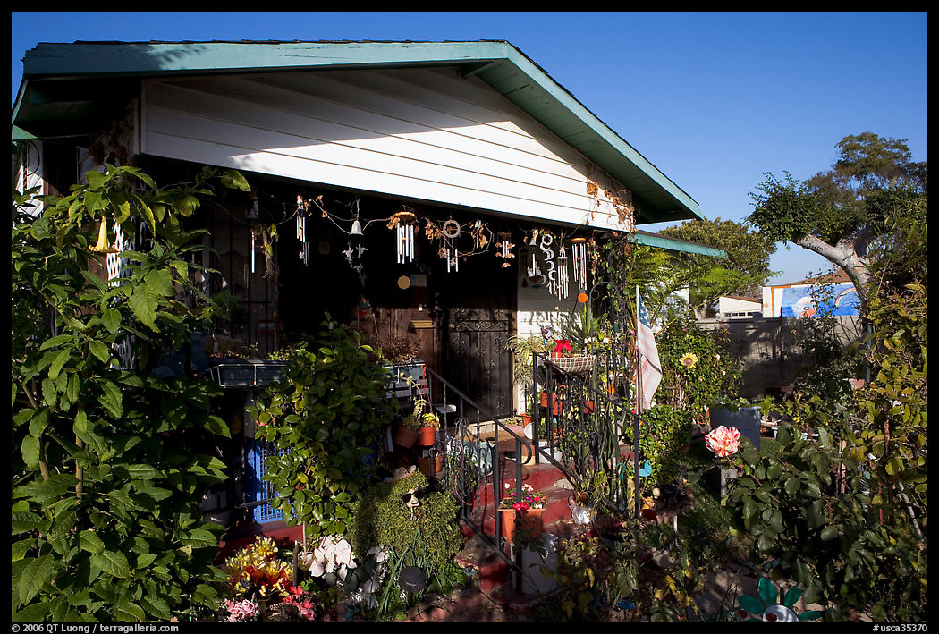 House and frontyeard, Watts. Watts, Los Angeles, California, USA