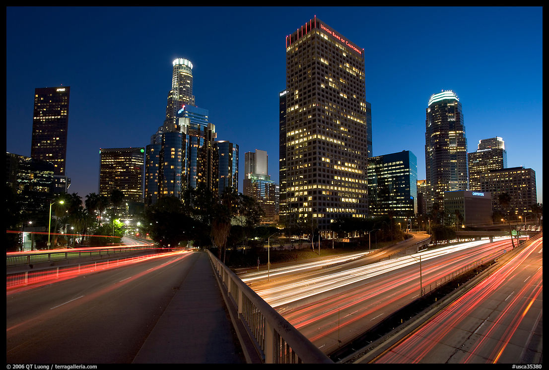 Bridge, Harbor Freeway, and skyline at nightfall. Los Angeles, California, USA