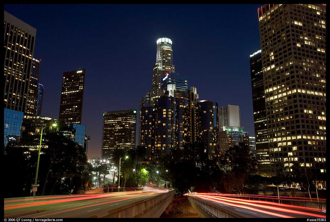 Traffic lights and skyline at night. Los Angeles, California, USA