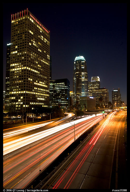 Traffic on Harbor Freeway and skyline at night. Los Angeles, California, USA
