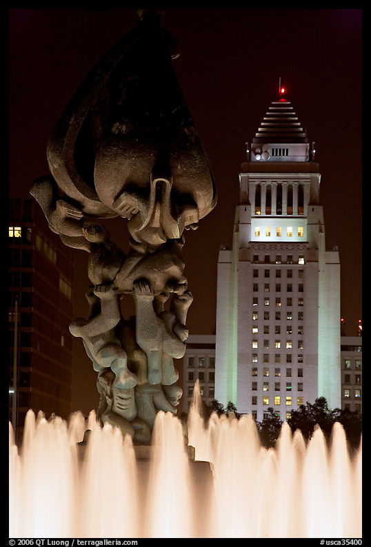 Peace on Earth sculpture, fountain, and City Hall at night. Los Angeles, California, USA