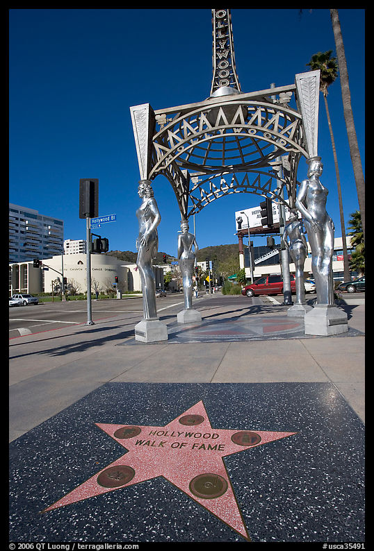 Star from the Hollywood walk of fame and gazebo with statues of actresses. Hollywood, Los Angeles, California, USA