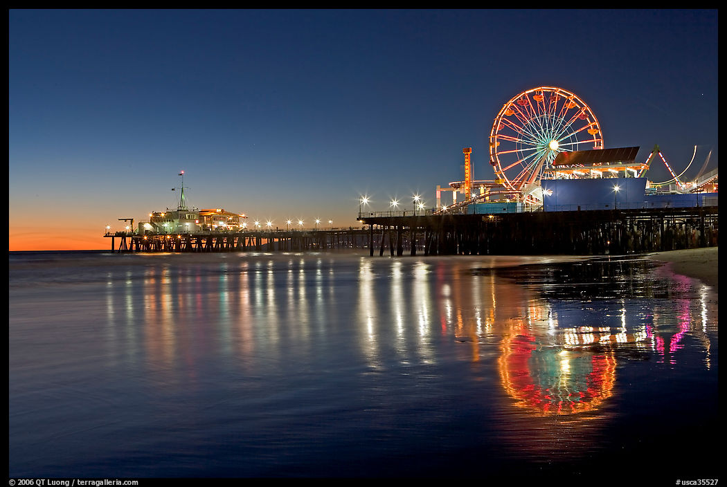 Pier, Ferris Wheel, and reflexions  at dusk. Santa Monica, Los Angeles, California, USA