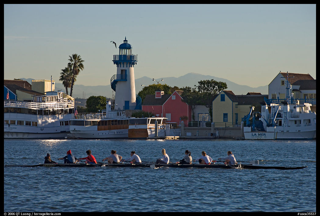 Women Rowers and lighthouse, early morning. Marina Del Rey, Los Angeles, California, USA