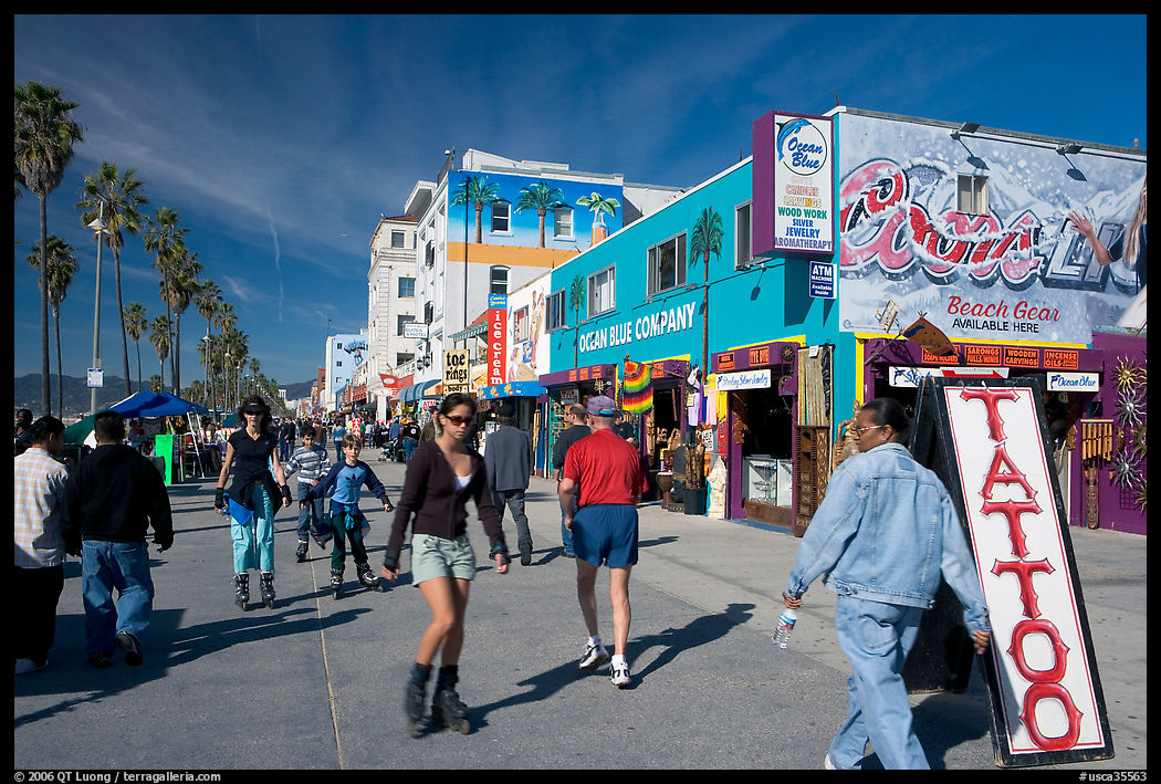 Rollerblading on colorful Ocean Front Walk. Venice, Los Angeles, California, USA