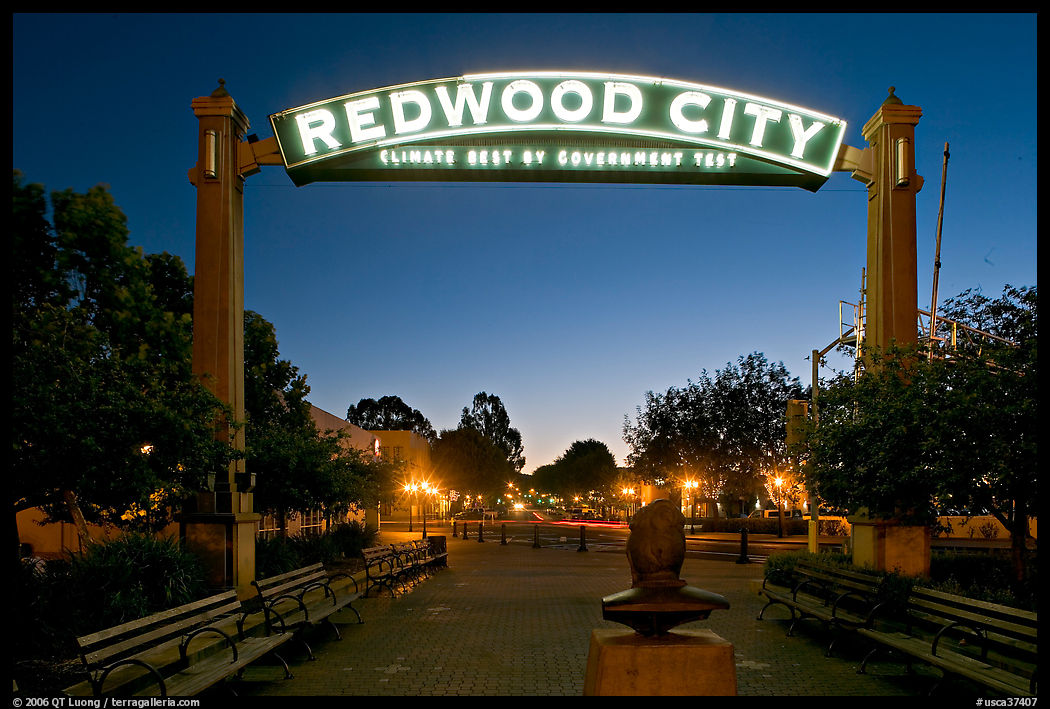 Broadway Street with Best Climate neon sign at dusk. Redwood City, SF Bay area, California, USA