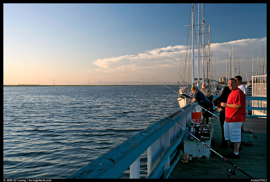 Fishing in the Port of Redwood, late afternoon. Redwood City, SF Bay area, California, USA