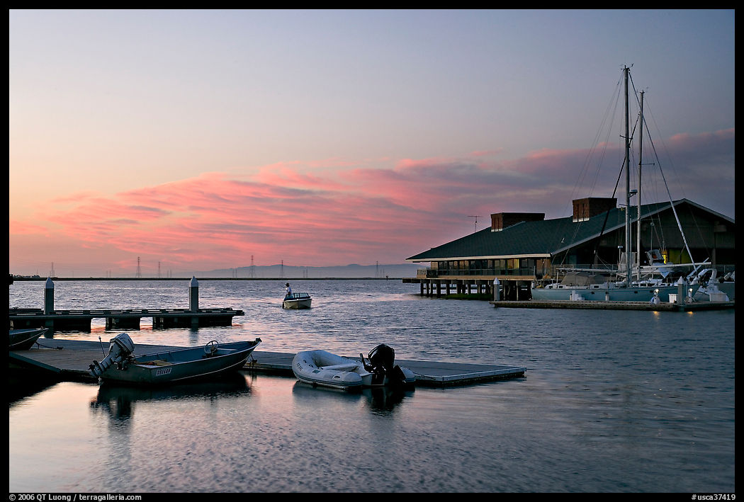 Marina, with small boat comming back to port at sunset. Redwood City, SF Bay area, California, USA