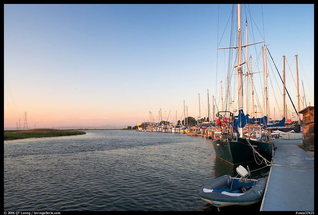 Yachts and Bair Island wetlands, sunset. Redwood City, SF Bay area, California, USA